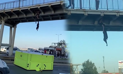 Korkunç! Kıyafetlerini çıkardı, üst geçitten sarktı...