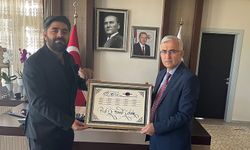 İbrahim Gültekin'den Prof. Dr. Kamil Çolak'a ziyaret