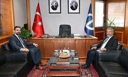 Gültekin’den Rektör Adıgüzel’e Ziyaret