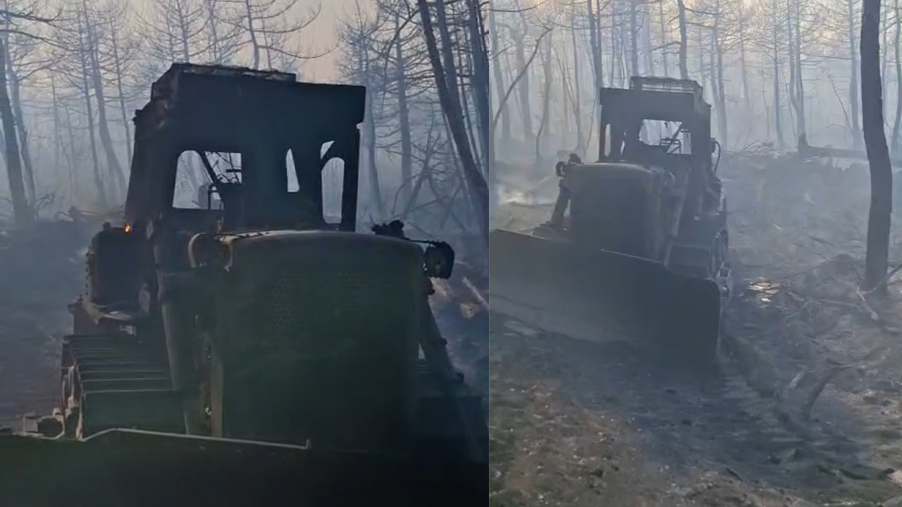 Alevlerin Ortasında Kalan Iş Makinesi